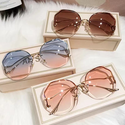 Ladies Irregular Round Sunglasses Women Brand Designer Gradient Fashion Sun Glasses Female Rimless Metal Curved Temples